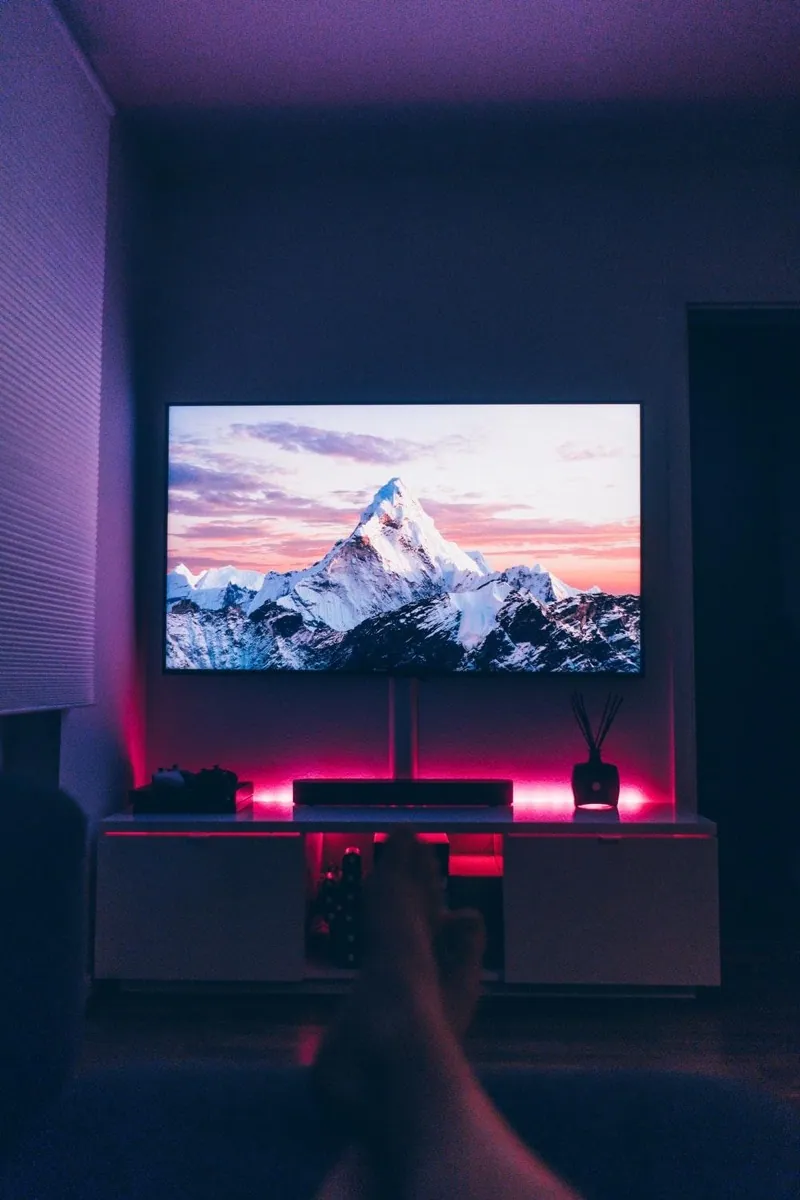A television displaying a mountain landscape